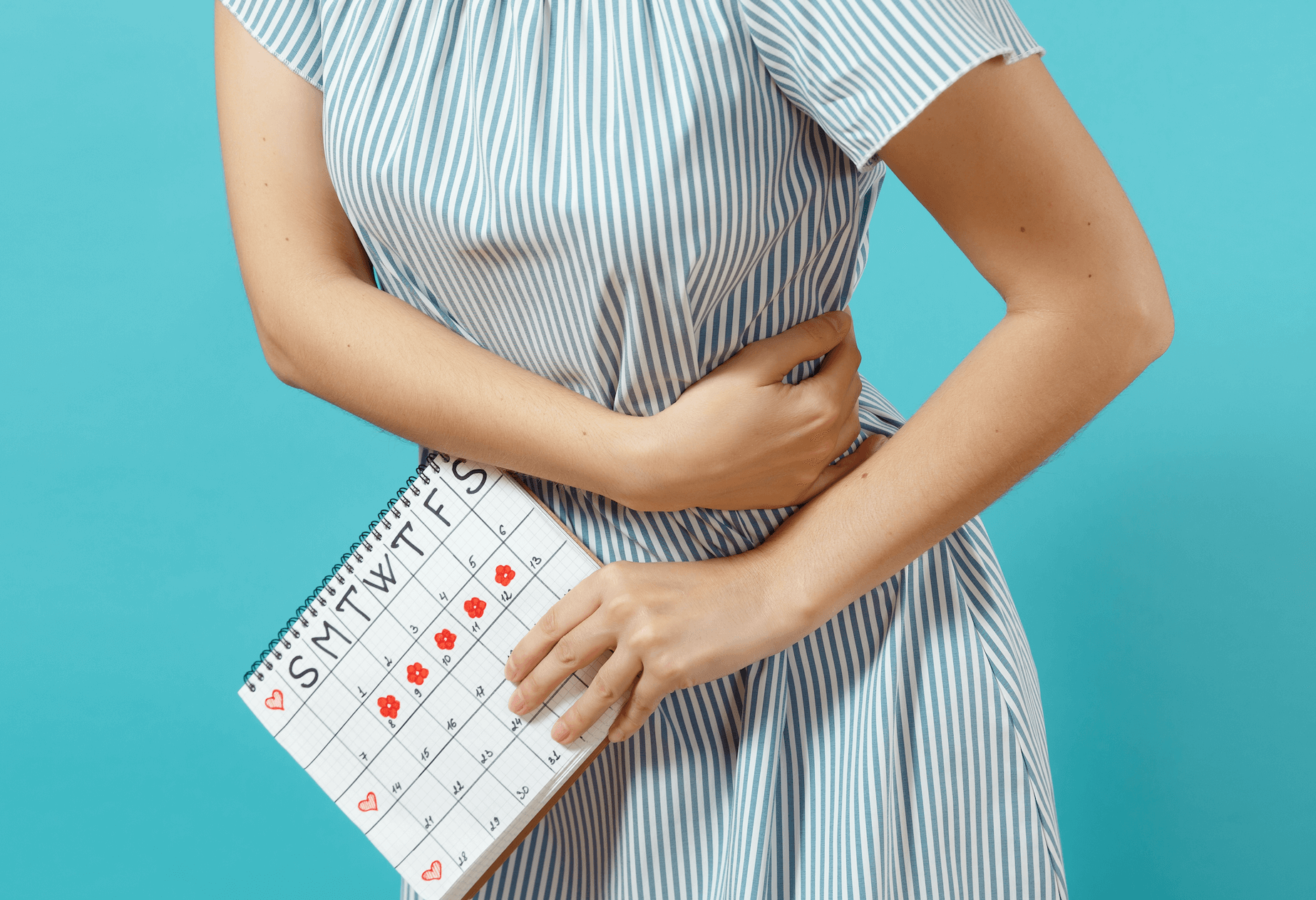 生理痛で苦しむ女性